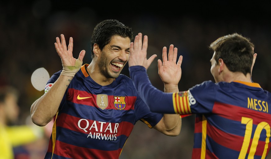 Suarez und Messi freuen sich über ihren gelungenen Streich.