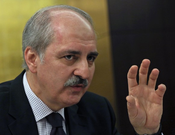 Numan Kurtulmus, deputy chairman of Turkey&#039;s ruling Justice and Development Party, AKP, speaks to the foreign media members in Ankara, Turkey, Tuesday, Jan. 21. 2014, amid a corruption scandal th ...