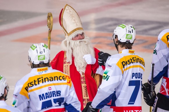 St. Nikolaus avec biennois Marc-Antoine Pouliot, lors de la rencontre du championnat suisse de hockey sur glace de National League, LNA, entre le HC Fribourg-Gotteron et le EHC Biel Bienne vendredi 2  ...