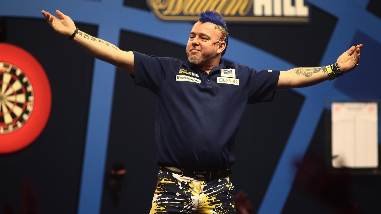 LONDON, ENGLAND - DECEMBER 27: Peter Wright of Scotland celebrates winning his second round match against Ronny Huybrechts of Belgium during Day Seven of the William Hill PDC World Darts Championships ...