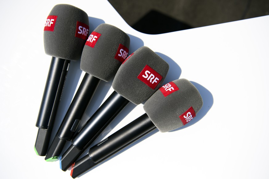 Microphones of swiss tv company SRF are pictured before a press conference of the Switzerland&#039;s national soccer team at the Torpedo Stadium, in Togliatti, Russia, Sunday, June 24, 2018. The Swiss ...