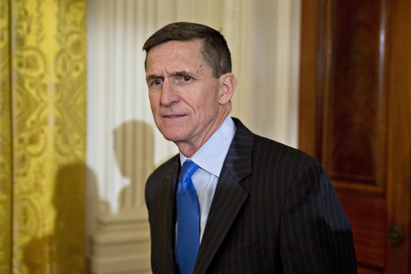 epa05879950 (FILE) - Retired Lieutenant General Michael Flynn, U.S. national security advisor, arrives to a swearing in ceremony of White House senior staff in the East Room of the White House in Wash ...