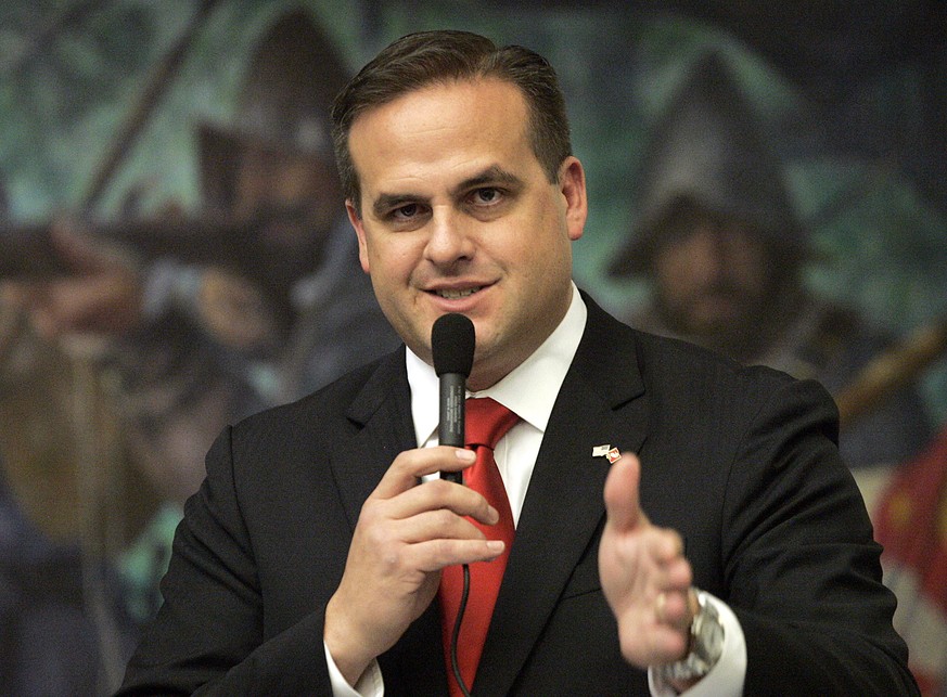 FILE - In this March 9, 2012, file photo Republican state senator Frank Artiles, R-Miami, asks a questions about a pip insurance bill during house session in Tallahassee, Fla. Artiles, who used a raci ...