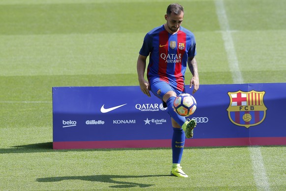 FC Barcelona&#039;s new signing Paco Alcacer controls the ball during his official presentation at the Camp Nou stadium in Barcelona, Spain, Thursday, Sept. 8, 2016. Barcelona has signed striker Paco  ...
