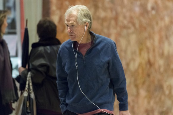 epa05703682 Peter Navarro, President-elect Trump&#039;s pick for head of the National Trade Council, arrives in the lobby of Trump Tower in New York, USA, 07 January 2017. The US President-elect Donal ...