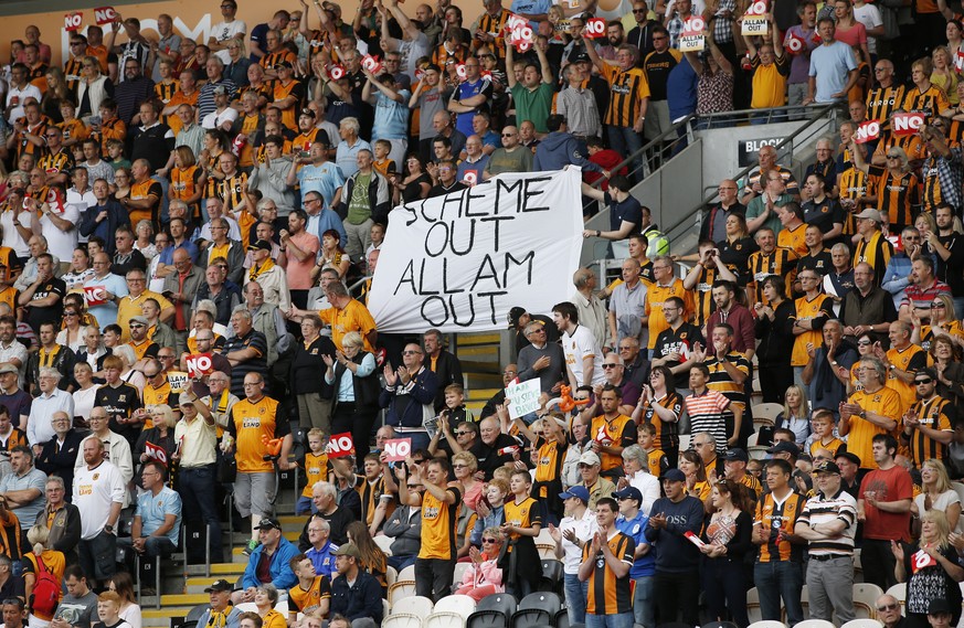 Britain Football Soccer - Hull City v Leicester City - Premier League - The Kingston Communications Stadium - 13/8/16
Hull fans with a banner in reference to Hull Chairman Assem Allam
Action Images  ...