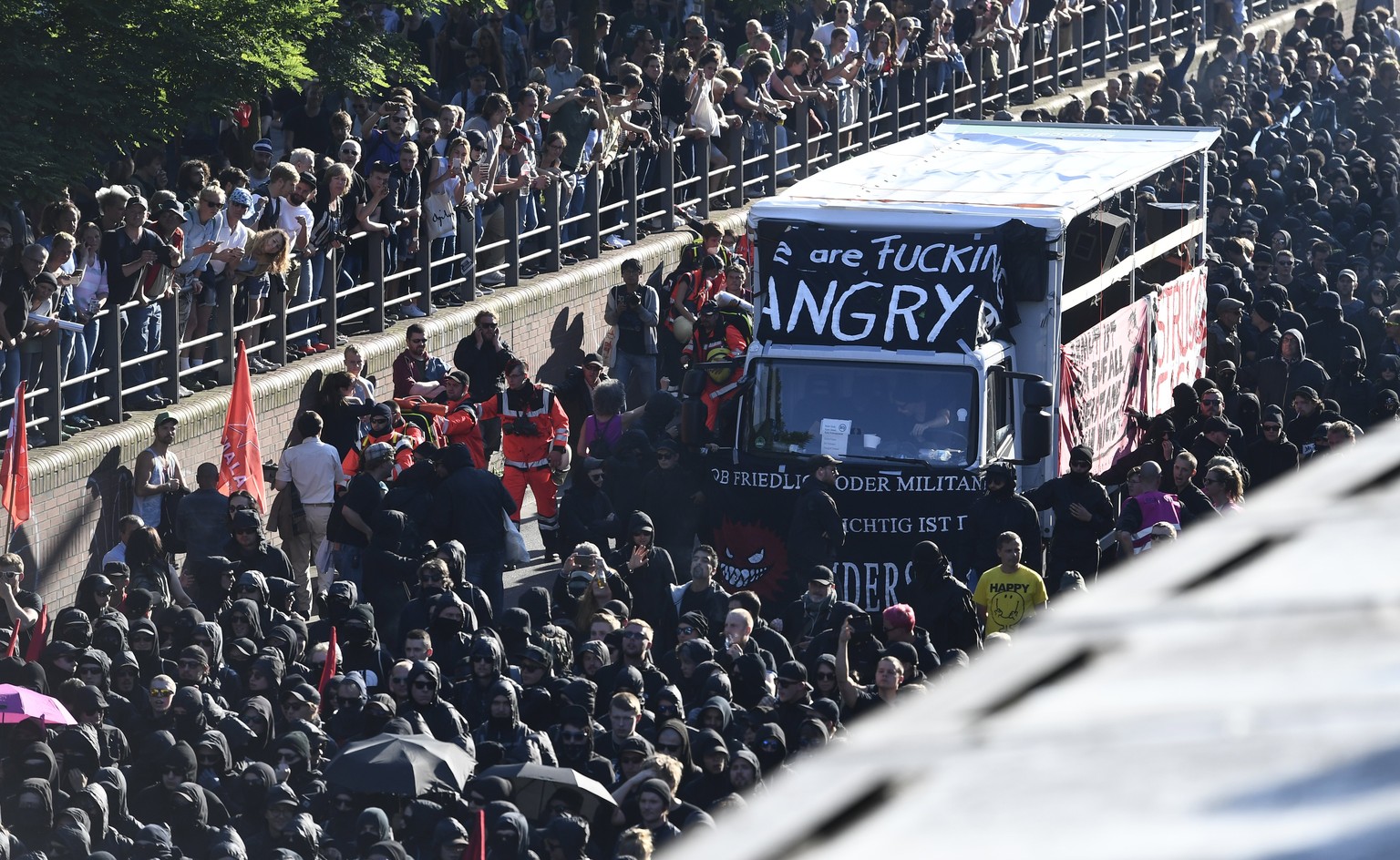 epa06070973 Protesters attend the demonstration &#039;Welcome to Hell&#039; at the Fish Market (fischmarkt) ahead of the G20 summit in Hamburg, Germany, 06 July 2017. The G20 Summit (or G-20 or Group  ...