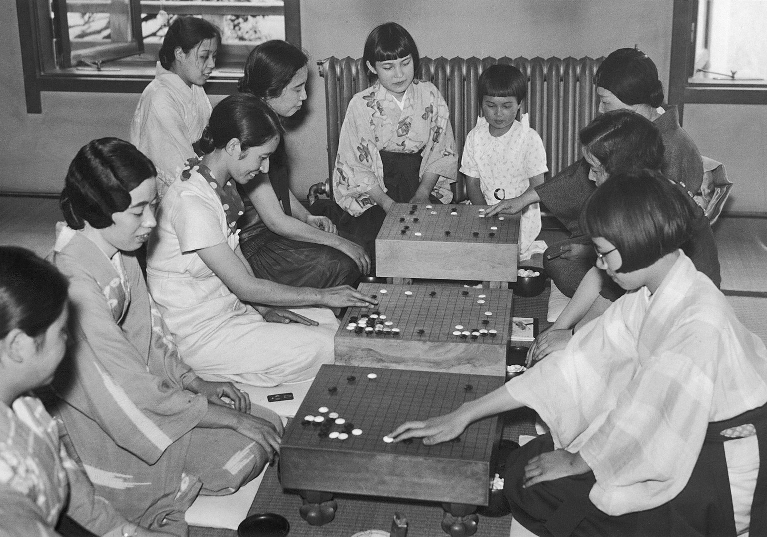 The game of go, a sort of ancient Asian chess, is extremely popular and there are regular go parlors in Japan like there are billiards parlors in the U.S. Here, a women-only go parlor is pictured, Mar ...