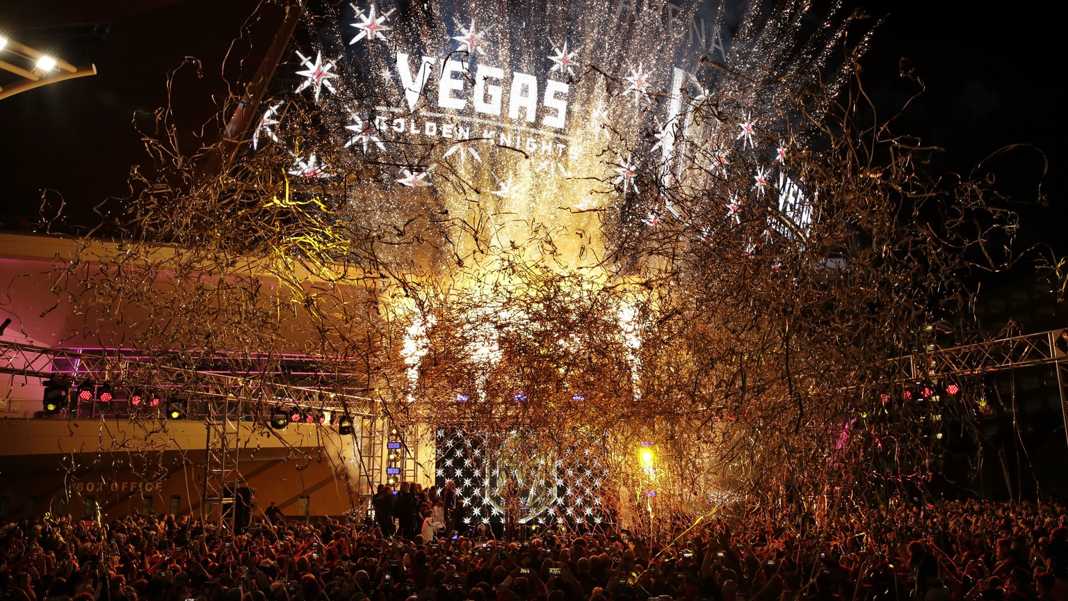 Confetti streams above teh crowd during an event to unveil the name of Las Vegas&#039; National Hockey League franchise, Tuesday, Nov. 22, 2016, in Las Vegas. The team will be called the Vegas Golden  ...