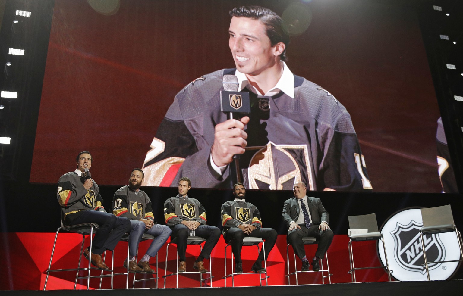 From left, Vegas Golden Knights&#039; Marc-Andre Fleury, Deryk Engelland, Brayden McNabb and Jason Garrison sit on stage during an event following the NHL expansion draft, Wednesday, June 21, 2017, in ...