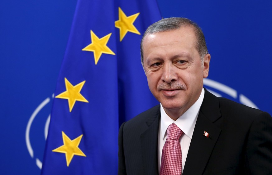 Turkey&#039;s President Tayyip Erdogan looks on ahead of a meeting at the EU Parliament in Brussels, Belgium October 5, 2015. Erdogan appeared to mock European Union overtures for help with its migrat ...