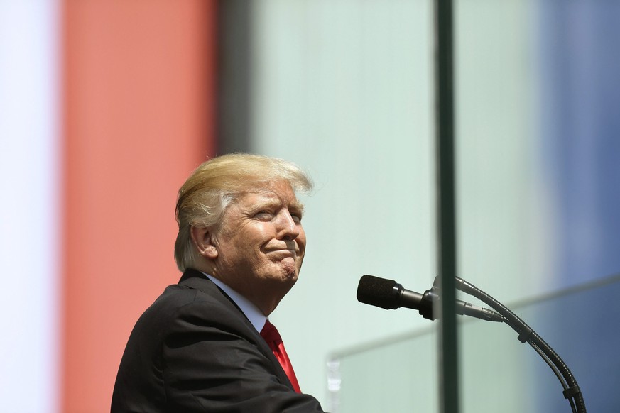 epa06069945 US President Donald J. Trump gives a speech at Krasinski Square, Warsaw, Poland, 06 July 2017. Trump is on an official visit to Poland. EPA/SZILARD KOSZTICSAK HUNGARY OUT