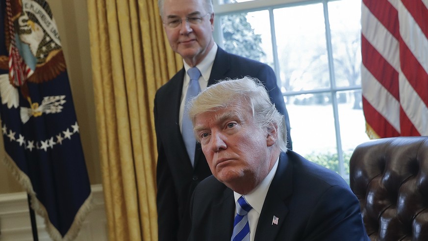 FILE - In this March 24, 2017 file photo, President Donald Trump with Health and Human Services Secretary Tom Price are seen in the Oval Office of the White House in Washington. With prospects in doub ...