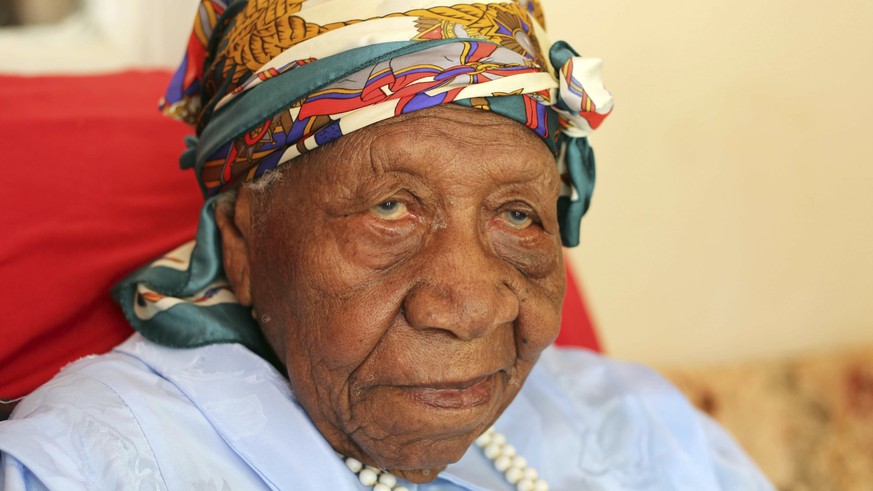 The world&#039;s oldest person Violet Brown poses for a photo at her home in Duanvale, Jamaica, Sunday, April 16, 2017. The 117-year-old woman living in the hills of western Jamaica is believed to hav ...