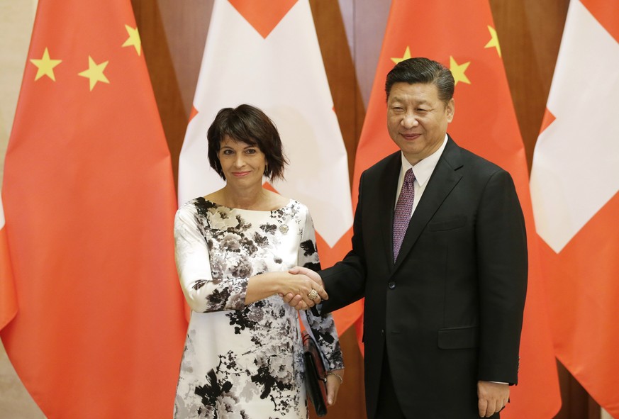 Swiss President Doris Leuthard poses with her Chinese counterpart Xi Jinping for a photo ahead of the Belt and Road Forum in Beijing Saturday, May 13, 2017. (Jason Lee/Pool Photo via AP)