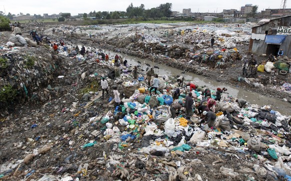 Scavengers search for recyclable materials at the Dandora dumping site on the outskirts of Kenya&#039;s capital Nairobi June 5, 2015. The dumping site was declared a health hazard for the neighbouring ...