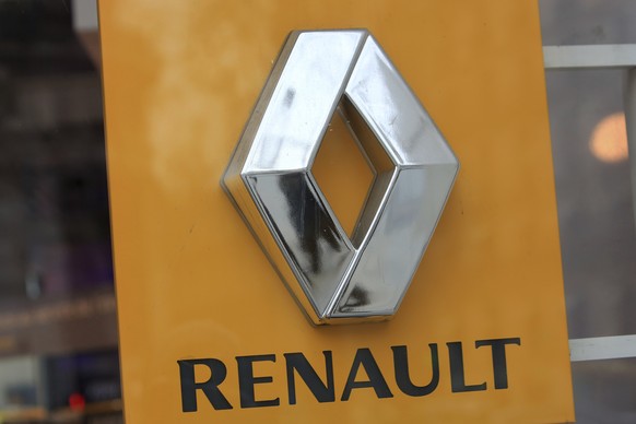 FILE - In this Jan. 19 2016 file photo, the Renault logo is pictured on a Renault showroom, in Paris. French magistrates are investigating suspected fraud by carmaker Renault involving its diesel emis ...