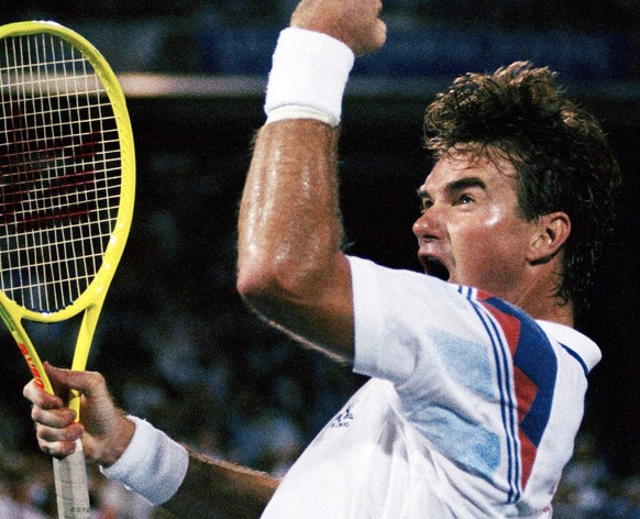 FILE - In this Sept. 5, 1991, file photo, Jimmy Connors celebrates a point against Paul Haarhuis, of the Netherlands, during their quarterfinals match at the U.S. Open tennis tournament in New York. F ...