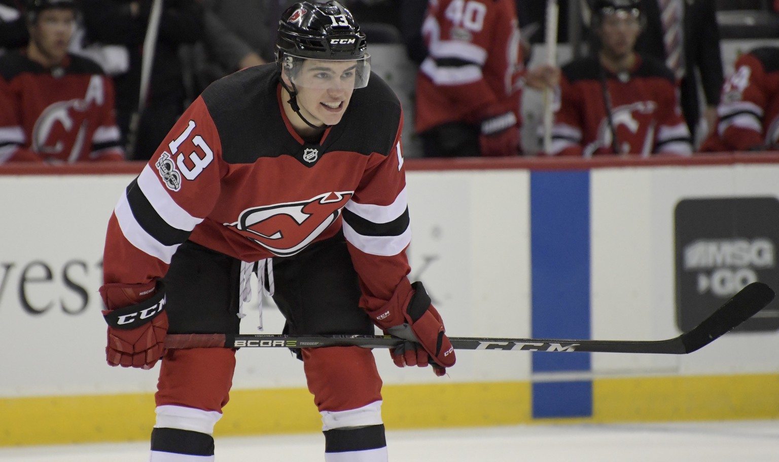 New Jersey Devils center Nico Hischier waits for a face-off during the second period of an NHL hockey game against the Colorado Avalanche Saturday, Oct. 7, 2017, in Newark, N.J. (AP Photo/Bill Kostrou ...