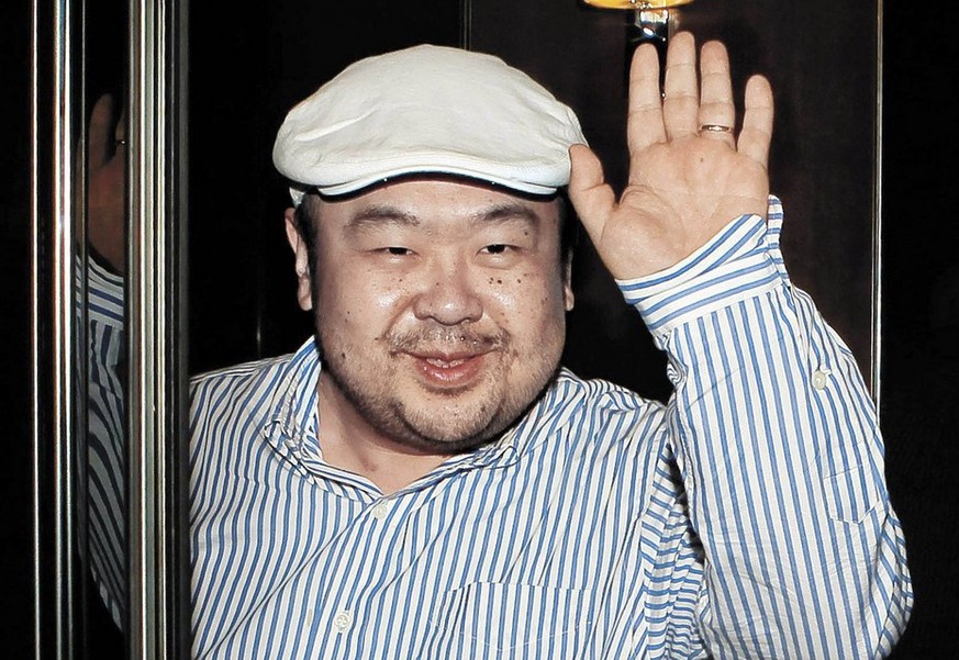In this June 4, 2010 photo, Kim Jong Nam, the eldest son of North Korean leader Kim Jong Il, waves after his first-ever interview with South Korean media in Macau, China. Kim Jong Nam says he opposes  ...