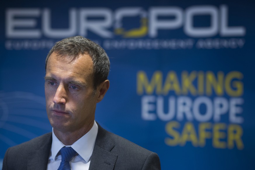 In this Friday Jan. 16, 2015 photo, the head of the European police agency Europol, Rob Wainwright, answers questions during an interview in The Hague, Netherlands. The European Union police agency ha ...