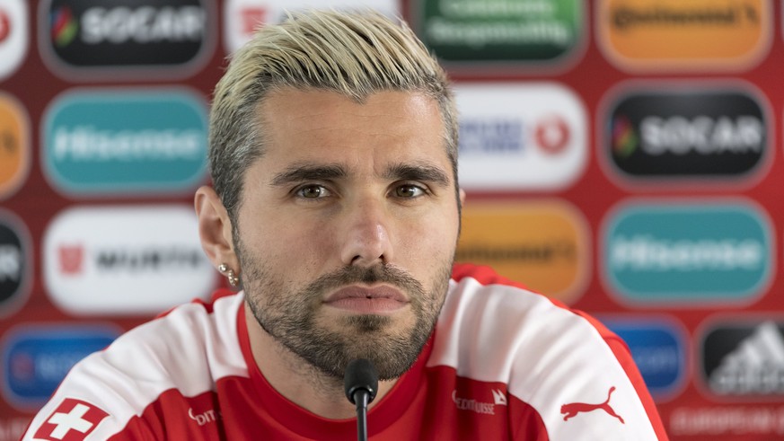 epa06017017 Switzerland&#039;s Valon Behrami speaks during a press conference at the Torsvollur football stadium in Torshavn, Faroe Islands, 08 June 2017. Switzerland is scheduled to play an 2018 Fifa ...