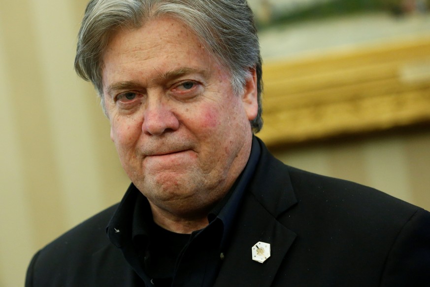 White House senior advisor Steve Bannon attends as U.S. President Donald Trump signs executive orders in the Oval Office at the White House in Washington, U.S. January 28, 2017. REUTERS/Jonathan Ernst