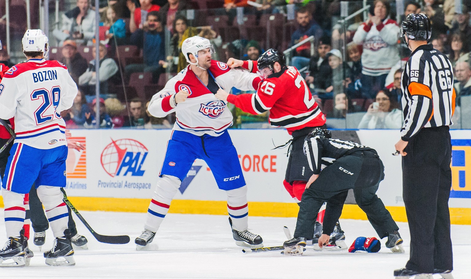 In this March 4, 2016 photo provided by the St. John&#039;s IceCaps, IceCaps player John Scott and Albany Devils&#039; Ben Thomson fight during an AHL game in St. John&#039;s, Newfoundland. The journe ...