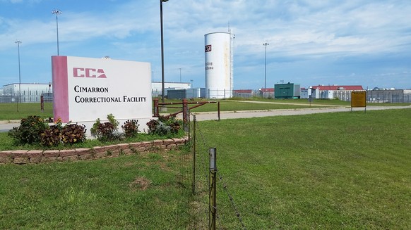 FILE - This Monday, Sept. 14, 2015 file photo shows the Cimarron Correctional Facility in Cushing, Okla. The stabbing deaths of four inmates at a private prison in Cushing were the result of a turf wa ...
