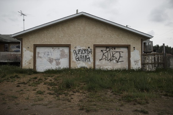 Gang related graffiti is seen painted on the walls of a building in Maskwacis, Alberta, Canada, Wednesday June 14, 2017. Maskwacis is a community of what in Canada are referred to as the &quot;First N ...