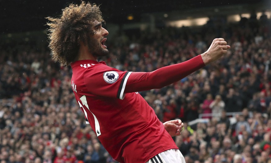 Manchester United&#039;s Marouane Fellaini celebrates scoring his side&#039;s second goal of the game during the English Premier League soccer match between Manchester United and Crystal Palace at Old ...