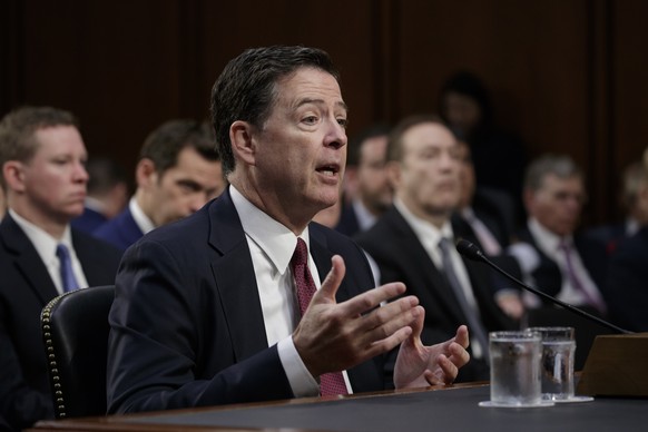 Formed FBI director James Comey recounts a series of conversations with President Donald Trump as he testifies before the Senate Select Committee on Intelligence, on Capitol Hill in Washington, Thursd ...