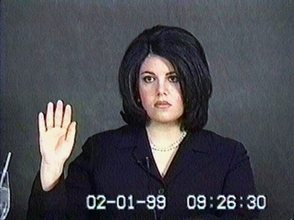 Monica Lewinsky, shown in this video image, is sworn in for her deposition on February 1, 1999. The videotape was shown on Saturday, Feb. 6, 1999, as part of the House Managers presentation in the Sen ...