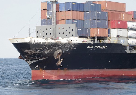 In this photo released by Japan&#039;s 3rd Regional Coast Guard Headquarters, the damage of Philippine-registered container ship ACX Crystal is seen in the waters off Izu Peninsula, southwest of Tokyo ...