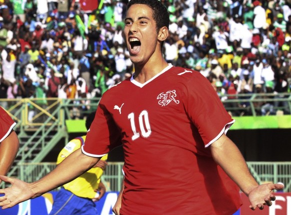 Switzerland&#039;s Nassim Ben Khalifa, right, reacts with fellow team member Haris Seferovic, left, after scoring on a penalty kick against Colombia during their Under-17 World Cup semifinal soccer ma ...