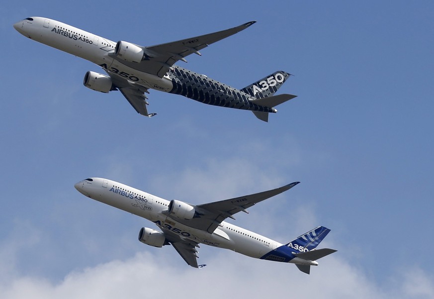 epa04524084 (FILE) Airbus A350XWB aircraft stage a test flight from the Airbus headquarters in Blagnac, Southern France, 29 September 2014. The planned handover of Airbus&#039; first A350 models was p ...