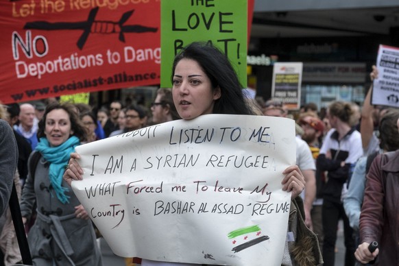 MELBOURNE, AUSTRALIA - SEPTEMBER 12: People take part in the European Wide Day of Action to Welcome Refugees on September 12, 2015 in Melbourne, Australia. Prime Minister Tony Abbott announced an addi ...