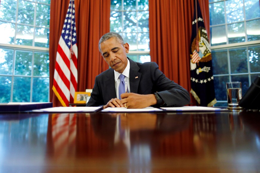 U.S. President Barack Obama signs into law S. 337: FOIA Improvement Act of 2016 and S. 2328: Puerto Rico Oversight, Management and Economic Stability Act at the Oval Office of the White House in Washi ...