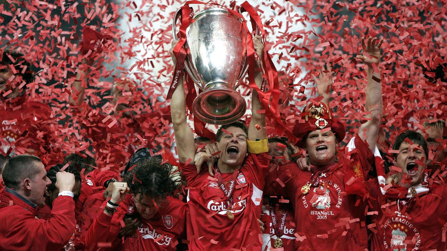 Liverpool&#039;s captain Steven Gerrard, center, lifts the Champions League trophy at The Ataturk Olympic Stadium, Istanbul, Turkey, Wednesday May 25, 2005. Liverpool won the Champions League final be ...