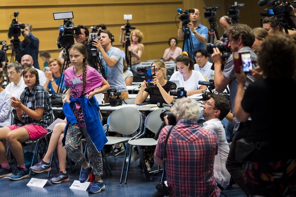 epa07757825 Swedish climate activist Greta Thunberg (C) reacts during a press conference of the &#039;Fridays For Future Summit&#039;, at the University of Lausanne (UNIL), in Lausanne, Switzerland, 0 ...