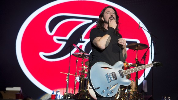 Dave Grohl of The Foo Fighters performs at The Bud Light Hotel, on Saturday, Feb. 1, 2014, in New York. (Photo by Greg Allen/Invision/AP)