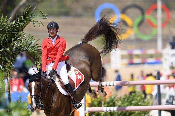 Romain Duguet of Switzerland rides his horse Quorida de Treho during the Equestrian Jumping individual and team qualifier in the Olympic Equestrian Centre in Rio de Janeiro, Brazil, at the Rio 2016 Ol ...