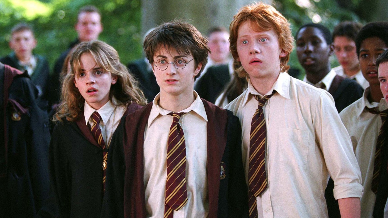 In this image released by Warner Bros., from left, Emma Watson as Hermione Granger, Daniel Radcliffe as Harry Potter and Rupert Grint as Ron Weasley are shown in a scene from &quot;Harry Potter and th ...