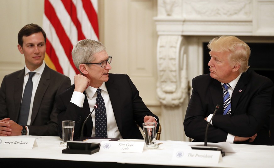 Tim Cook, Chief Executive Officer of Apple, speaks as President Donald Trump, right, and Jared Kushner, White House Senior Adviser, left, listen during an American Technology Council roundtable in the ...