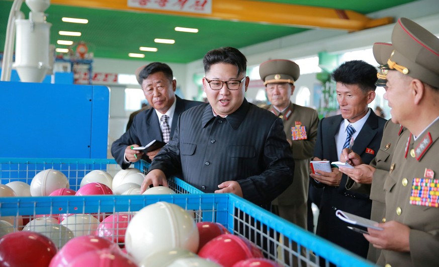 North Korean leader Kim Jong Un visits the newly-built combined fishing-tackle factory under the Korean People&#039;s Army (KPA), in this undated photo released by North Korea&#039;s Korean Central Ne ...