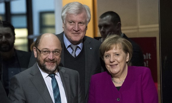 Martin Schulz, chairman of the German Social Democratic Party (SPD), front left, German Chancellor and chairwomen of the German Christian Democratic Union Party (CDU), Angela Merkel, front right, and  ...