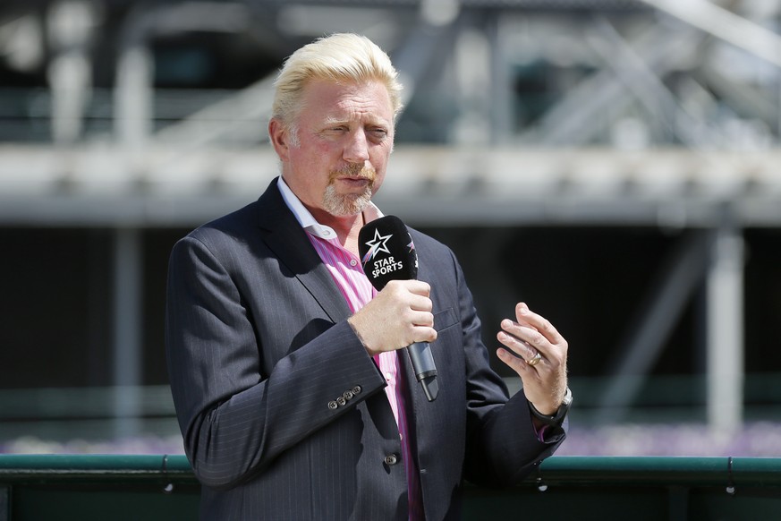 German former tennis champion Boris Becker speaks on the tv channel Star Sports, at the Wimbledon Championships at the All England Lawn Tennis Club, in London, Britain, 10 July 2017. (KEYSTONE/Peter K ...