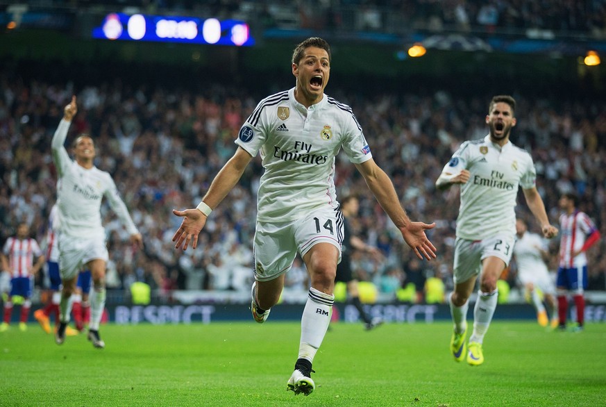 MADRID, SPAIN - APRIL 22: Javier Hernandez of Real Madrid CF (14) celebrates as he scores their first goal during the UEFA Champions League quarter-final second leg match between Real Madrid CF and Cl ...