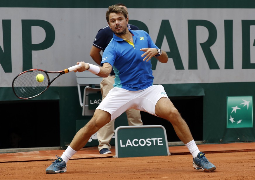 epa05999157 Stan Wawrinka of Switzerland in action against Jozef Kovalik of Slovakia during their men’s 1st round single match during the French Open tennis tournament at Roland Garros in Paris, Franc ...