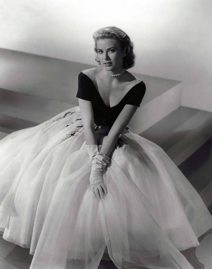 This photo released by Lisa Lori Communications shows a dress worn by Grace Kelly in the film &quot;Rear Window&quot; that inspired Carolina Herrera to design her own version. (AP Photo/Lisa Lori Comm ...